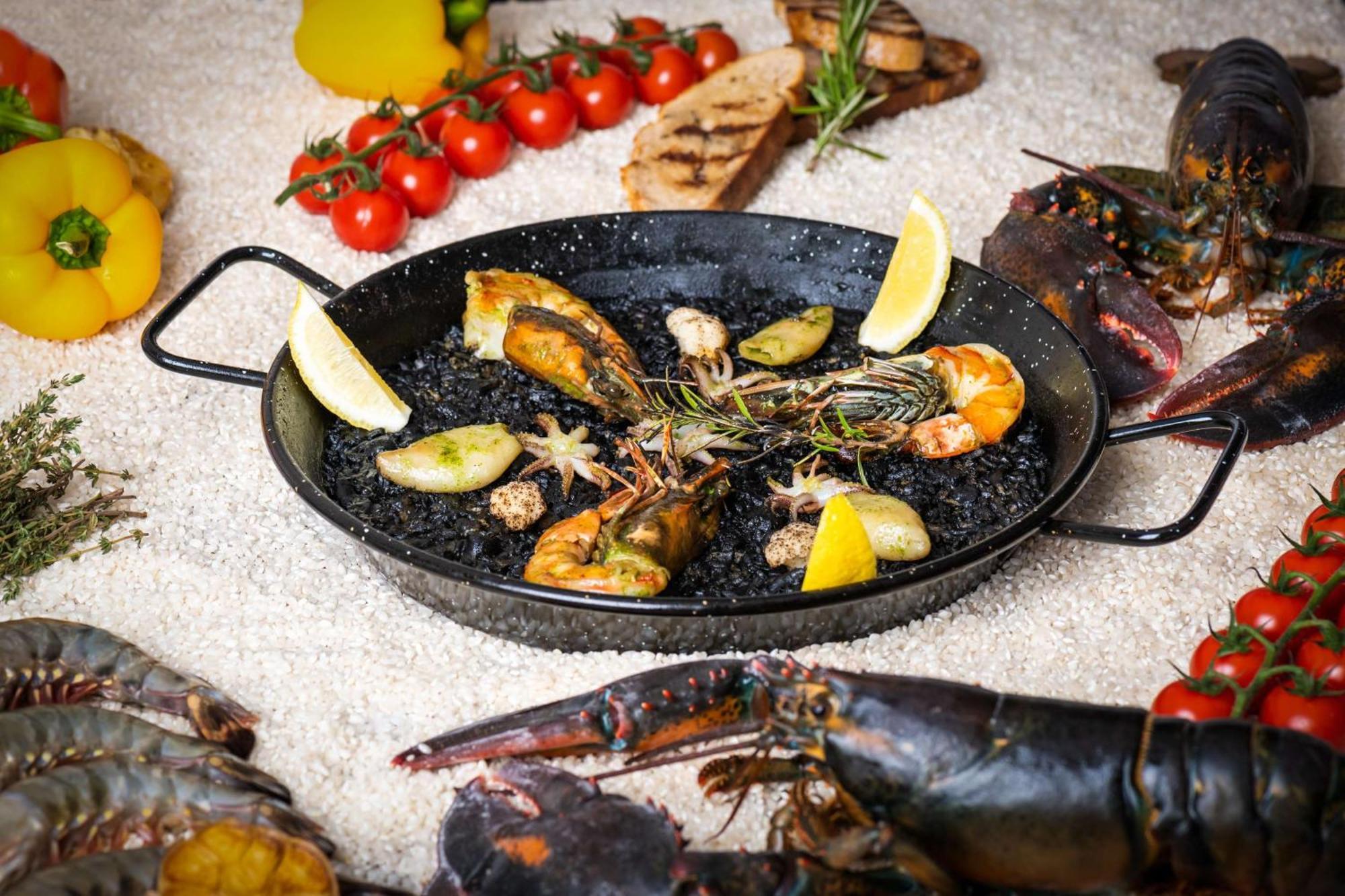 Ja Beach Hotel, Dubai Bagian luar foto Arroz negro